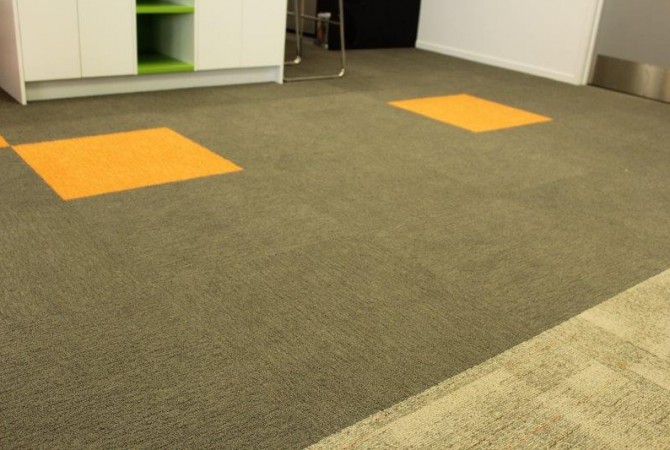 Commercial carpet tiles with accent tiles